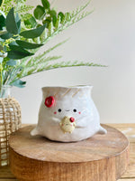 Flowery dumpling pot with baby dumpling