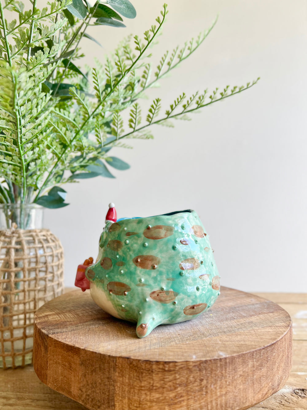 Festive grumpy Froggo planter bearing gift, photo 6 of 15