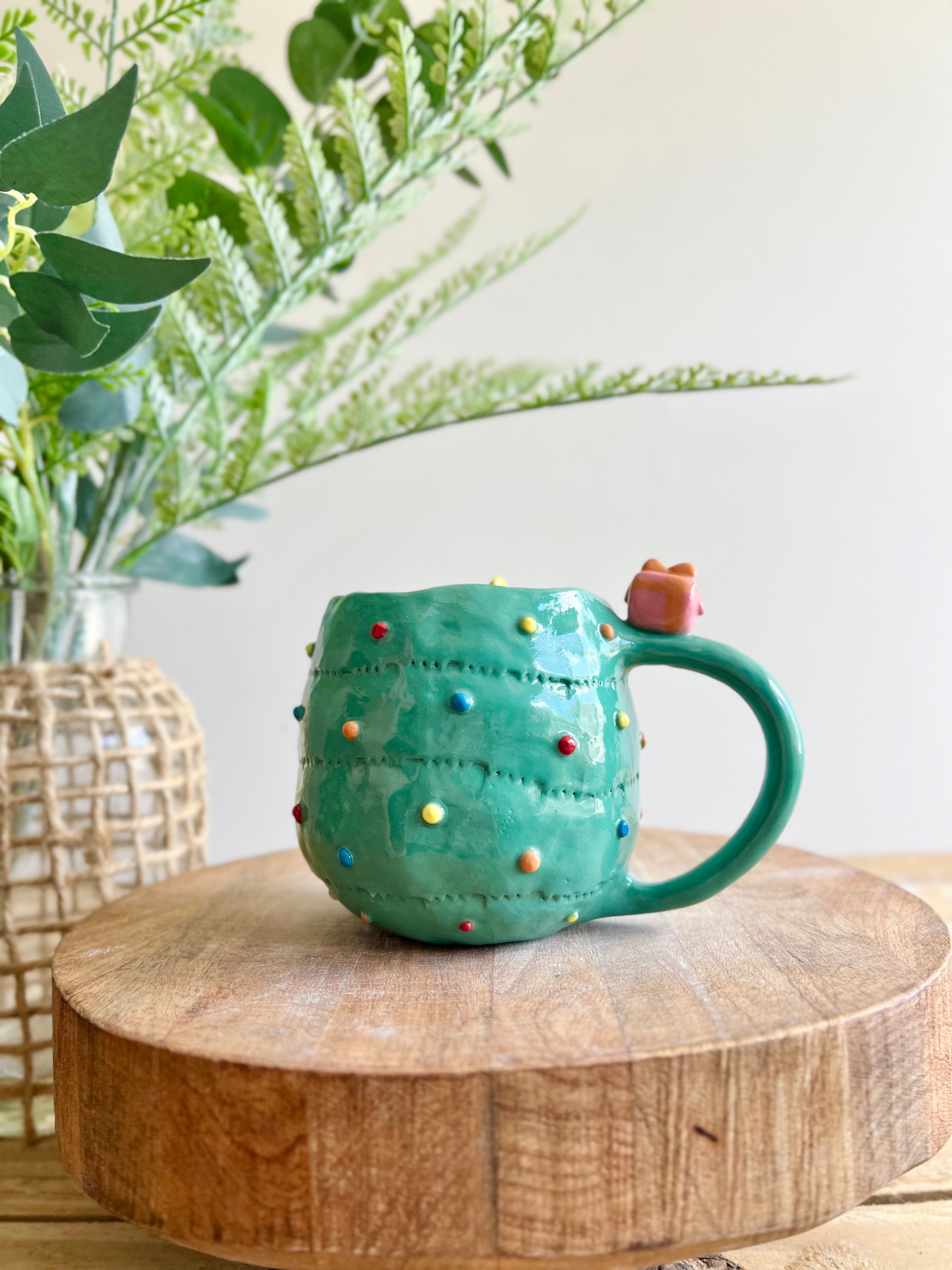 Christmas tree mug with gingerbread and present friend