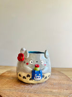 Totoro pot with Chibi Totoro pot and friend