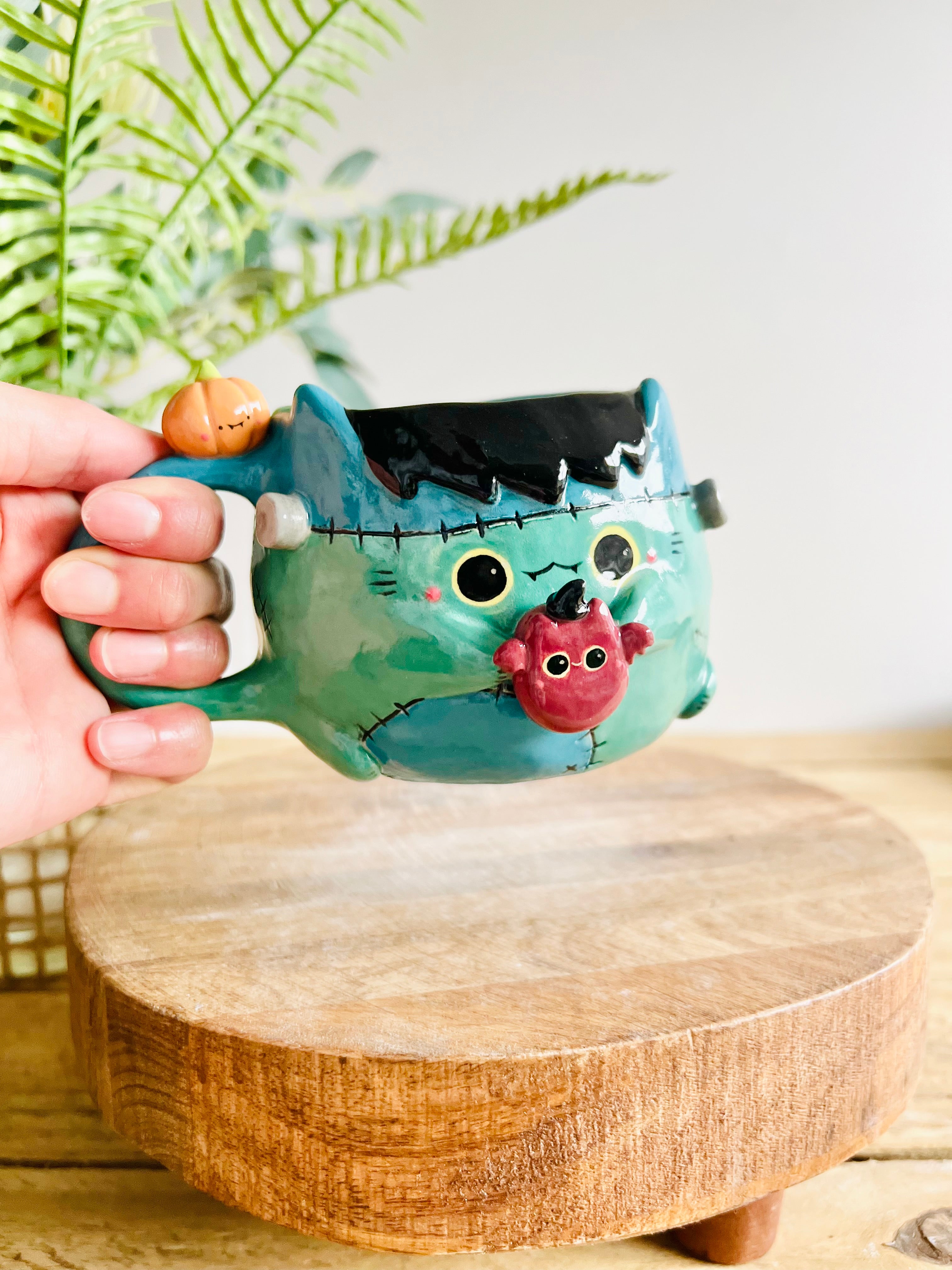 Franken-Kitty mug with bat friend