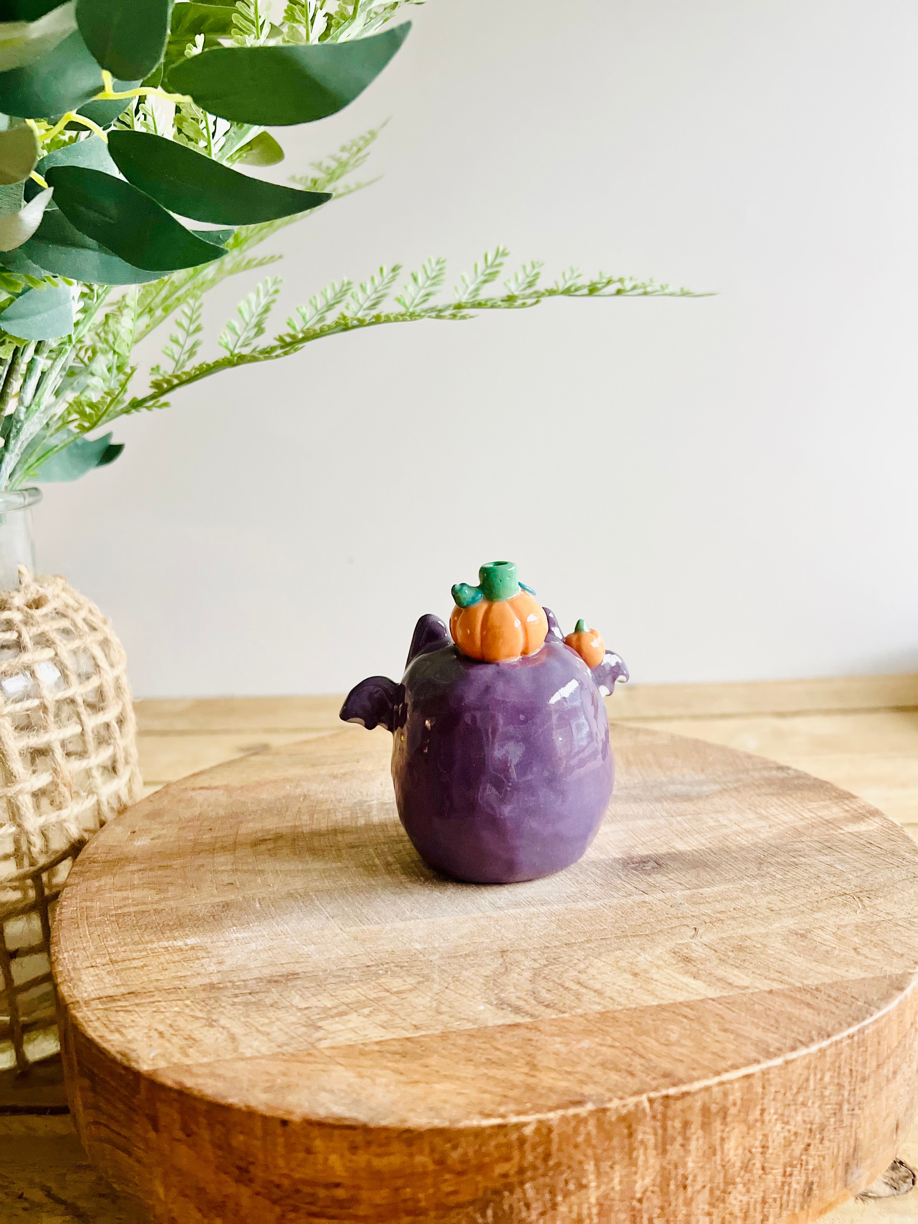 Bat with pumpkin friends bud vase