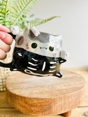 Skeleton kitty mug with cat skull friends