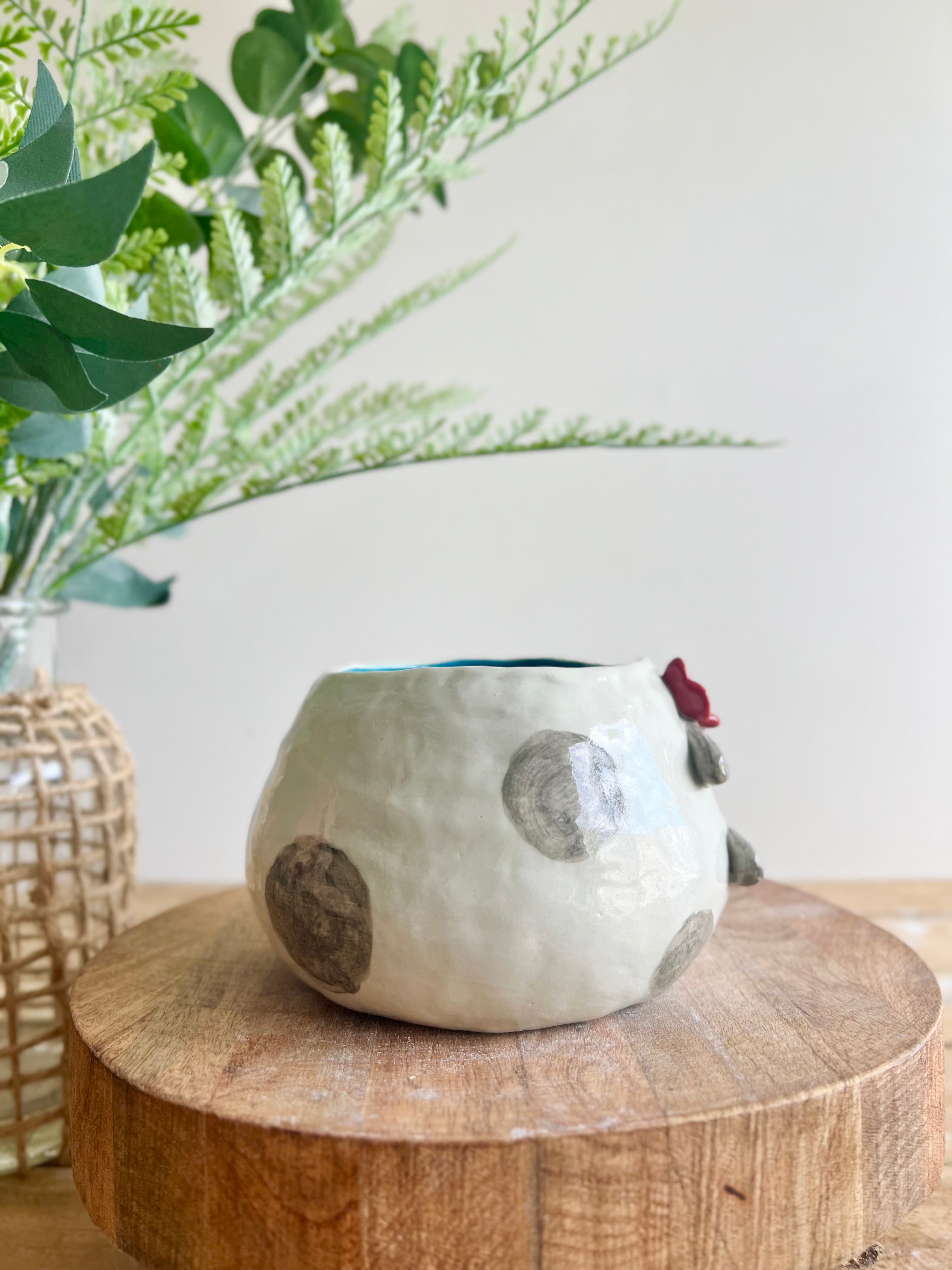 Flowery sideways bunny pot with gingerbread friend