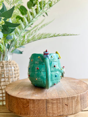 Christmas tree mug with grey cat and present friend