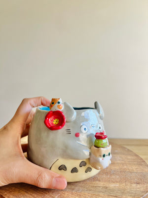 Totoro pot with cat pot and friend