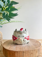 Festive grey bunny pot with gingerbread friend