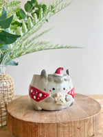 Festive grey bunny pot with gingerbread friend