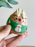 Green Christmas sweater reindeer bud vase