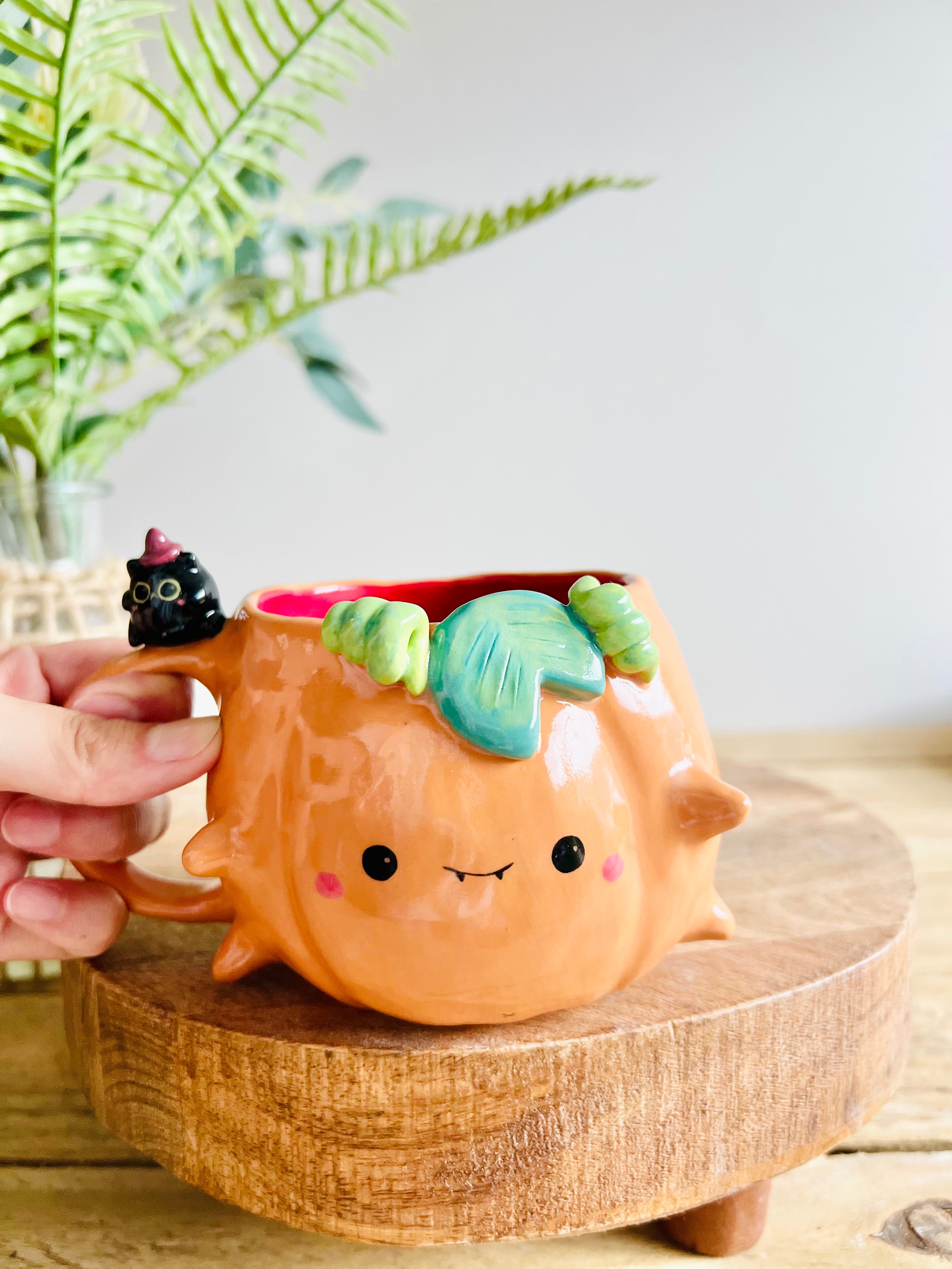 Pumpkin mug with black cat friend