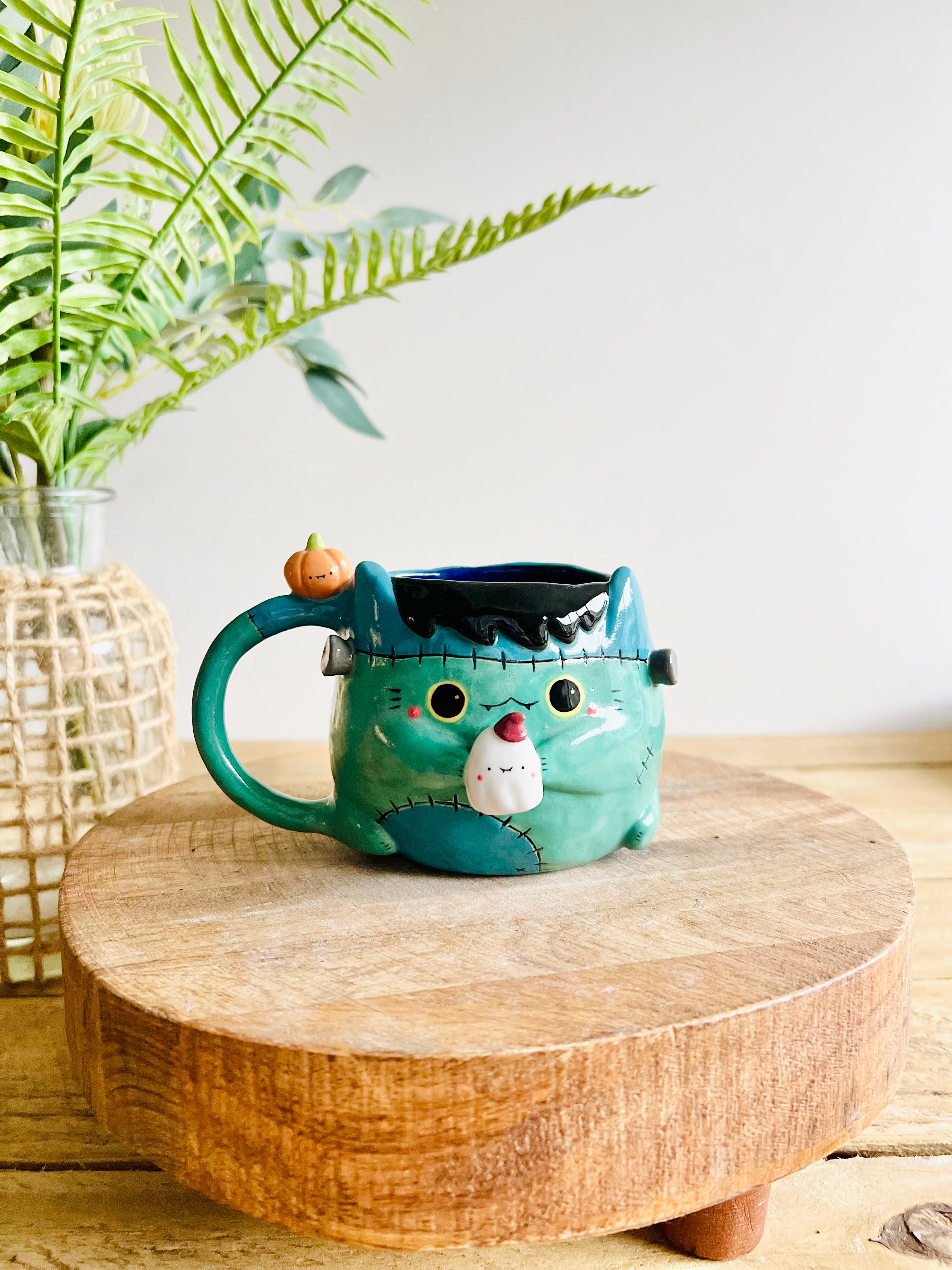 Franken-kitty mug with ghost friend