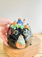 Black cat pot with Totoro and pumpkin friends