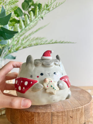 Festive grey bunny pot with gingerbread friend