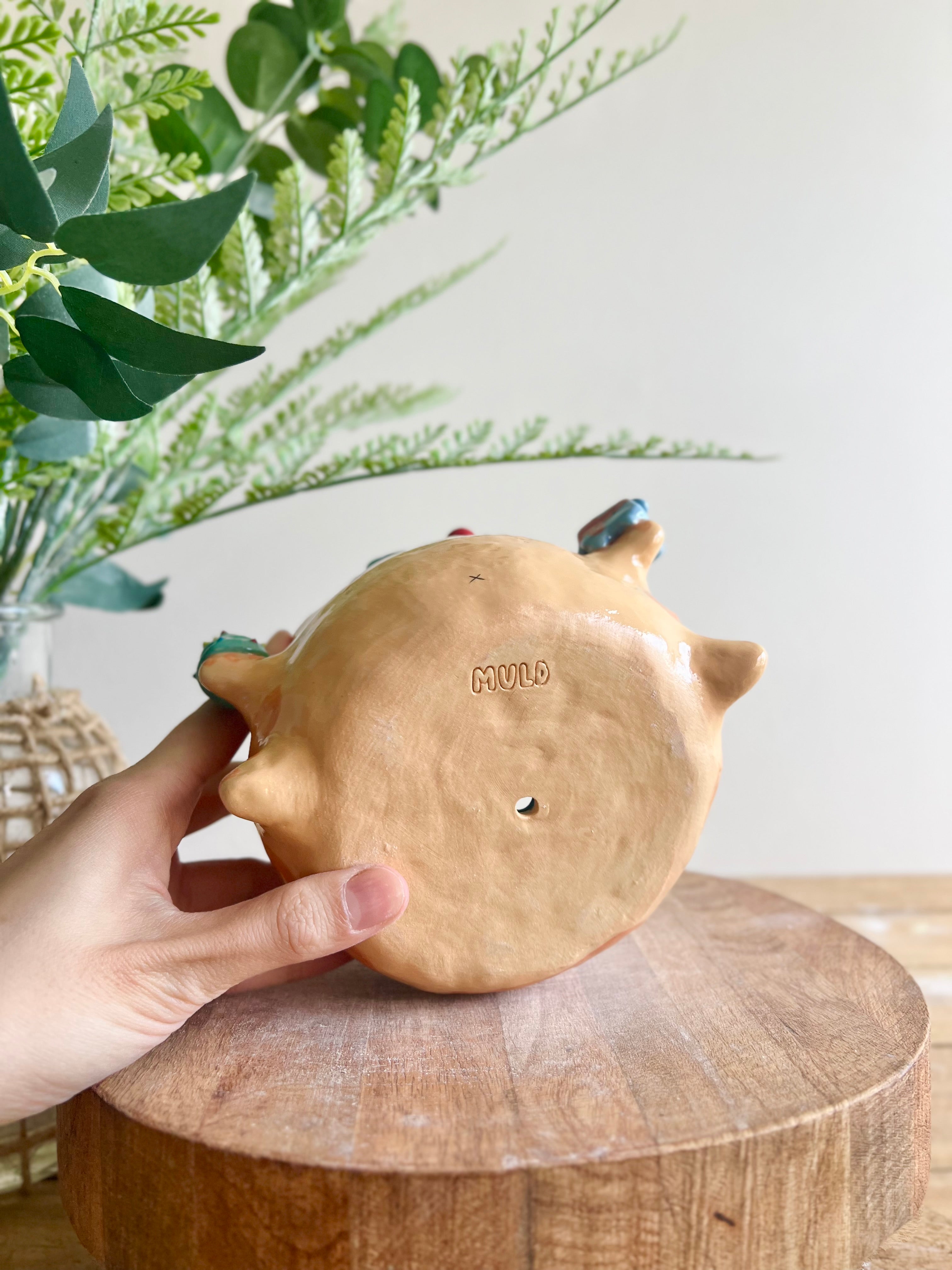 Gift bearing festive Ginger cat pot with Christmas tree friend