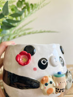 Flowery panda pot with bubble tea and animal friends