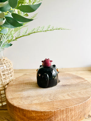 Black cat with bat and pumpkin friends bud vase