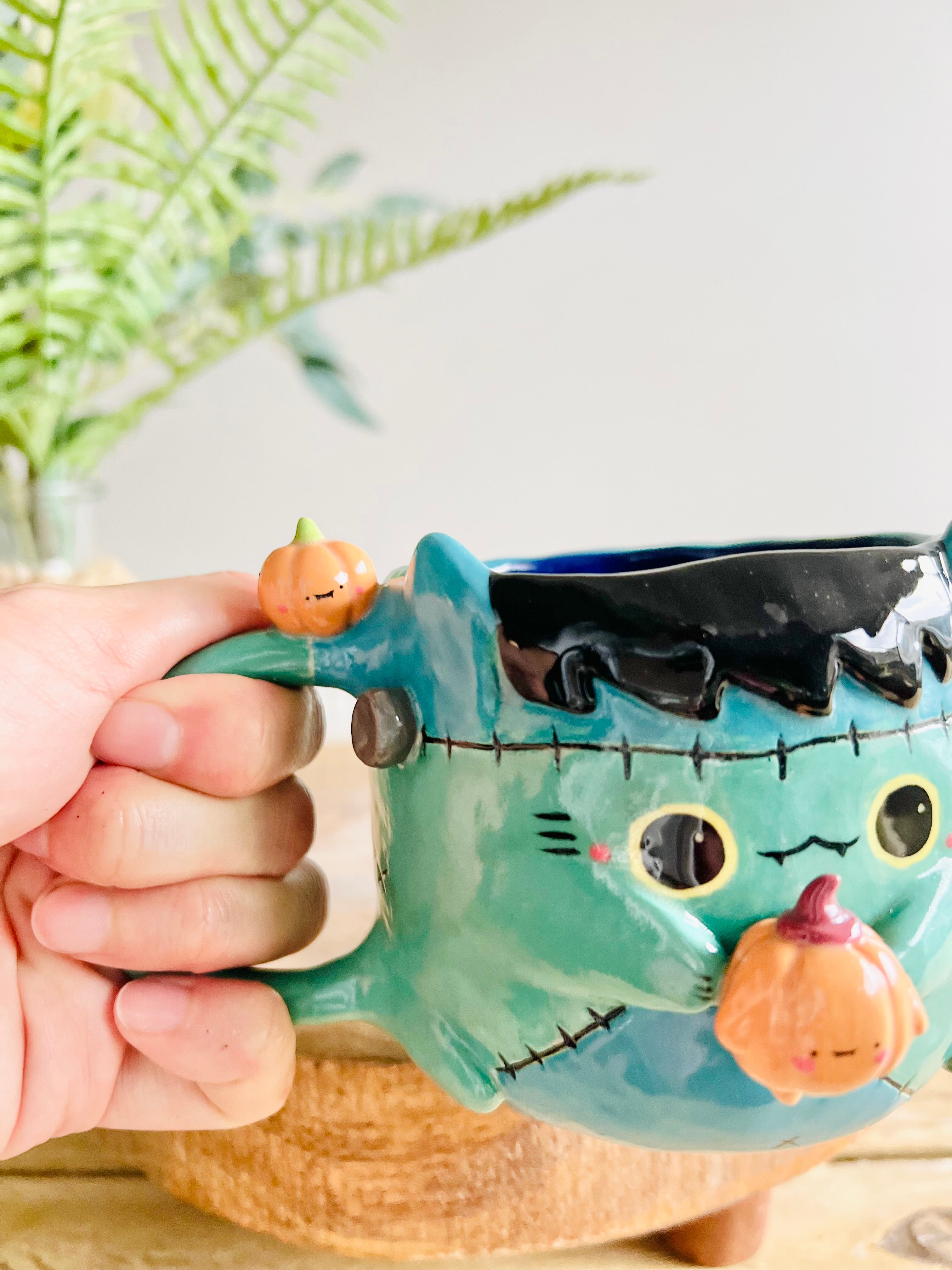 Franken-kitty mug with pumpkin friends