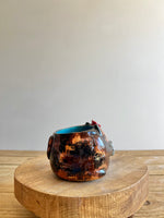 Tortie pot