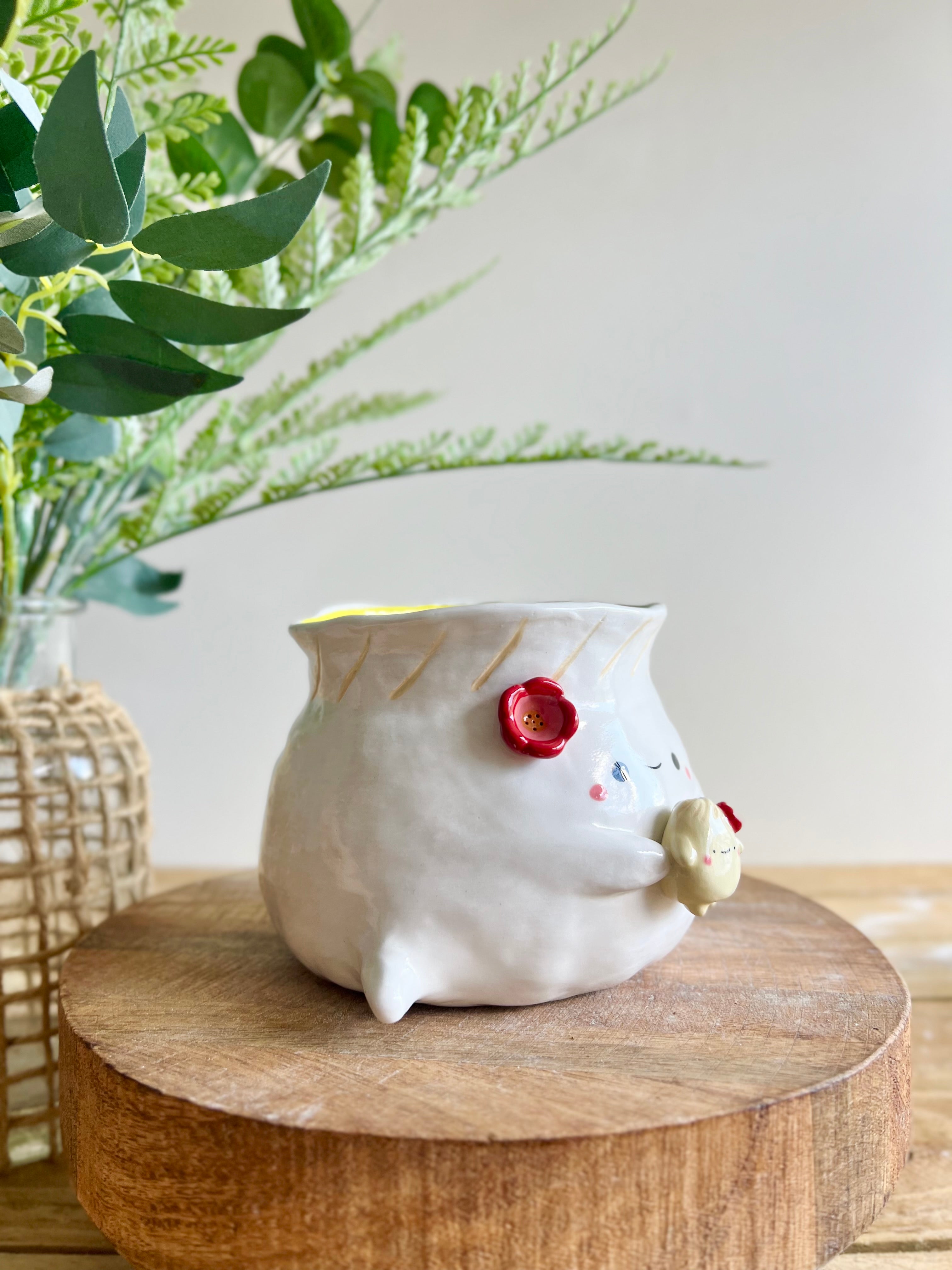 Flowery dumpling pot with baby dumpling