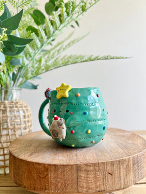 Christmas tree mug with grey cat and present friend