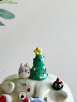 Festive sideways Totoro vase