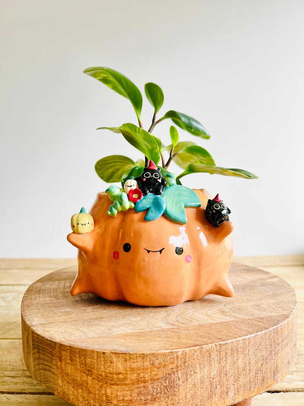Pumpkin pot with black cat and baby pumpkin friends, photo 1 of 9