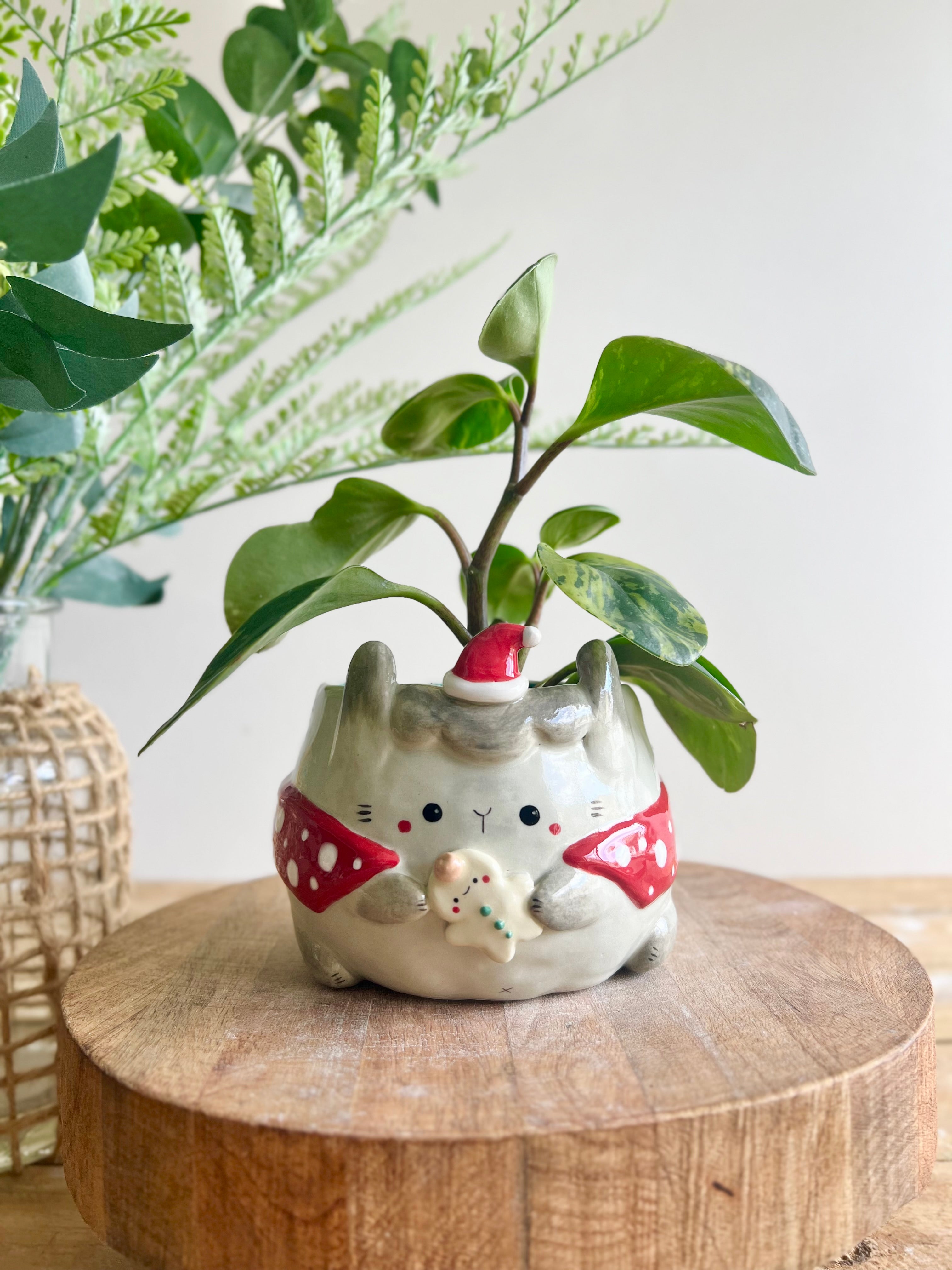 Festive grey bunny pot with gingerbread friend