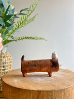 Long dog bud vase