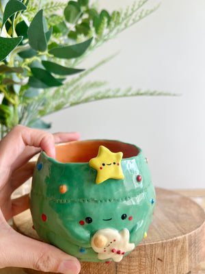 Christmas tree planter with gingerbread friend