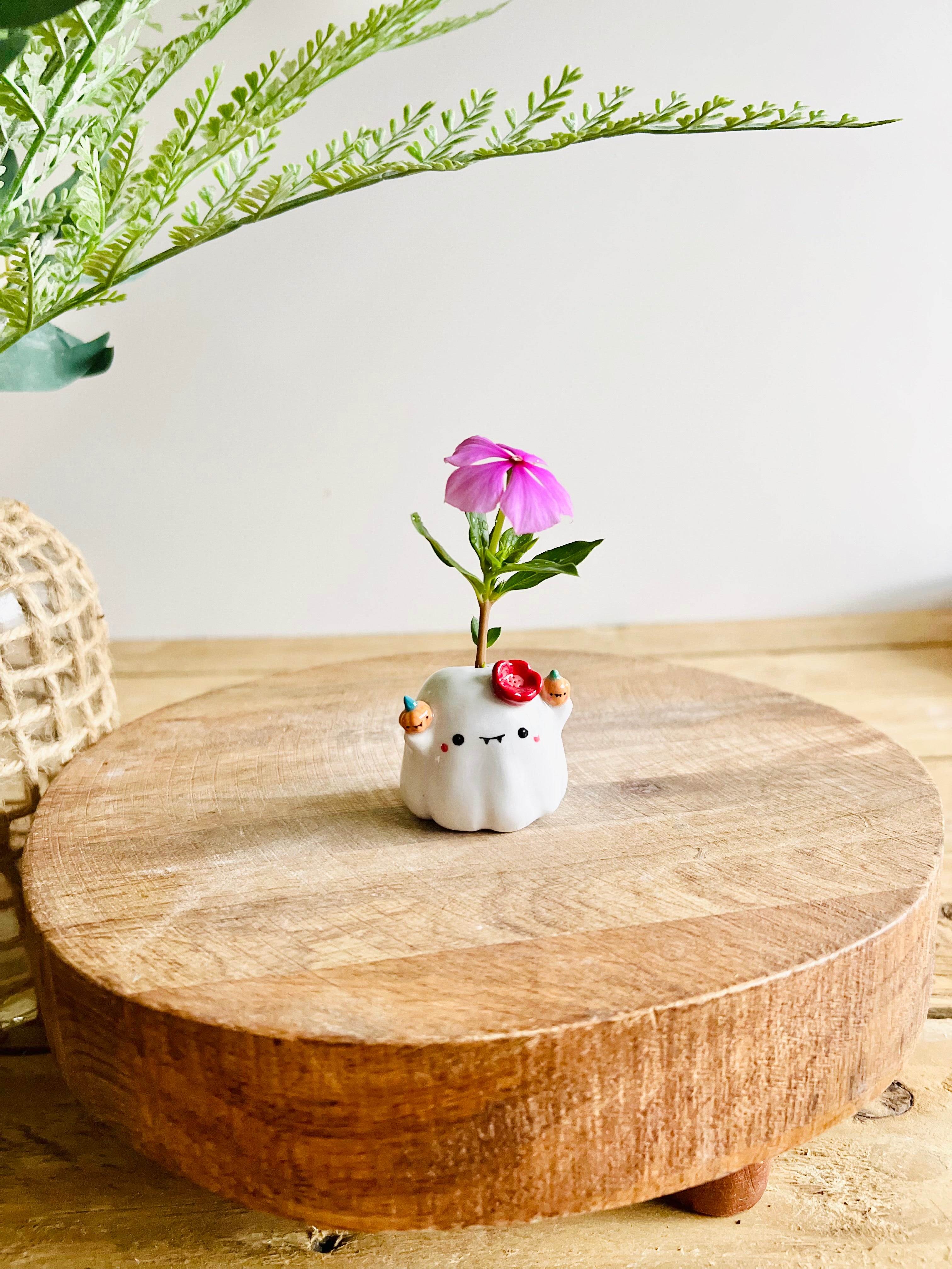 Tiny ghost with pumpkin friends bud vase