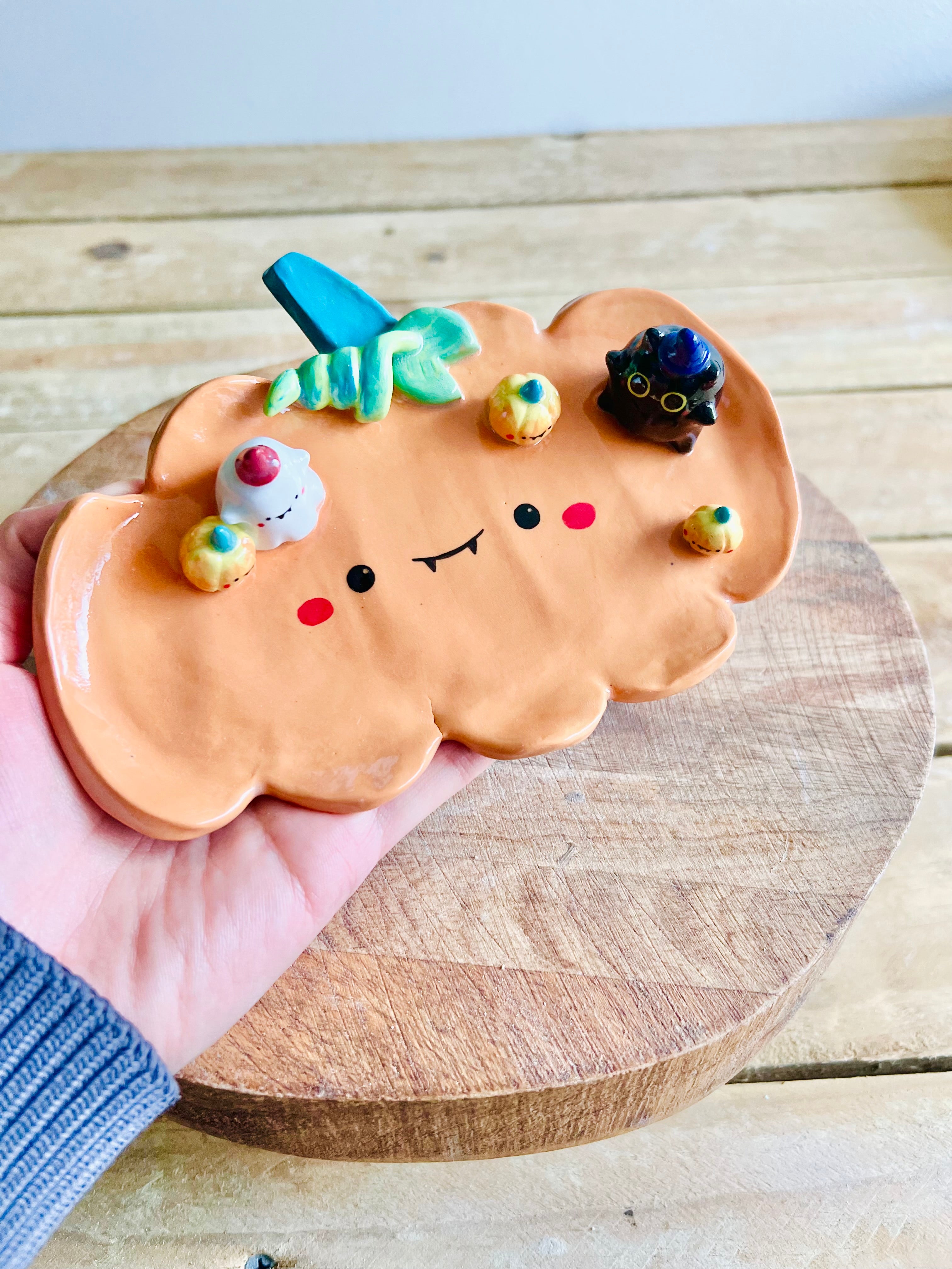 SECONDS: pumpkin trinket dish with black cat, ghost and pumpkin friends