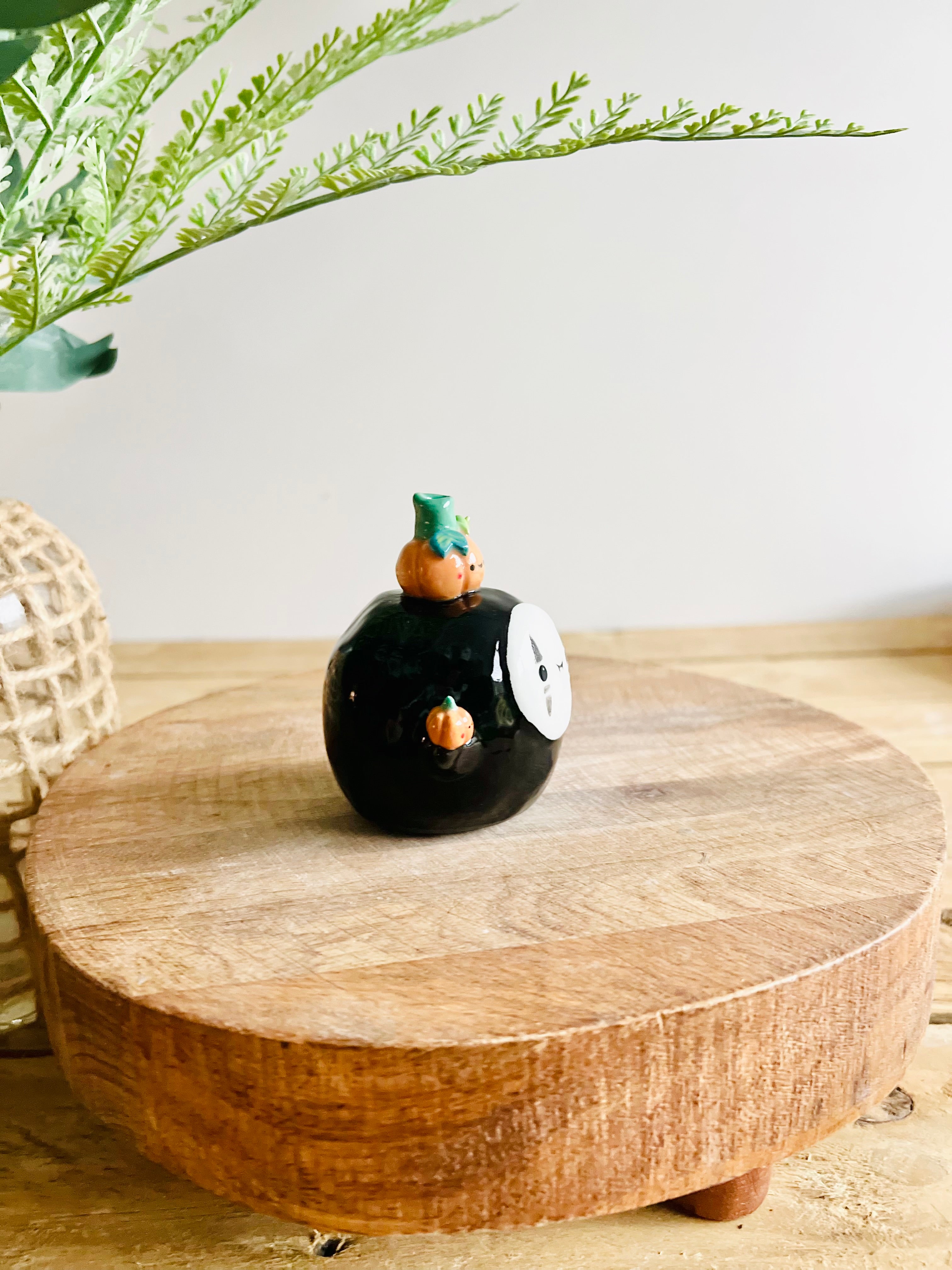 No Face with pumpkin friends bud vase