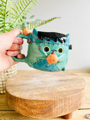 Franken-kitty mug with pumpkin friends