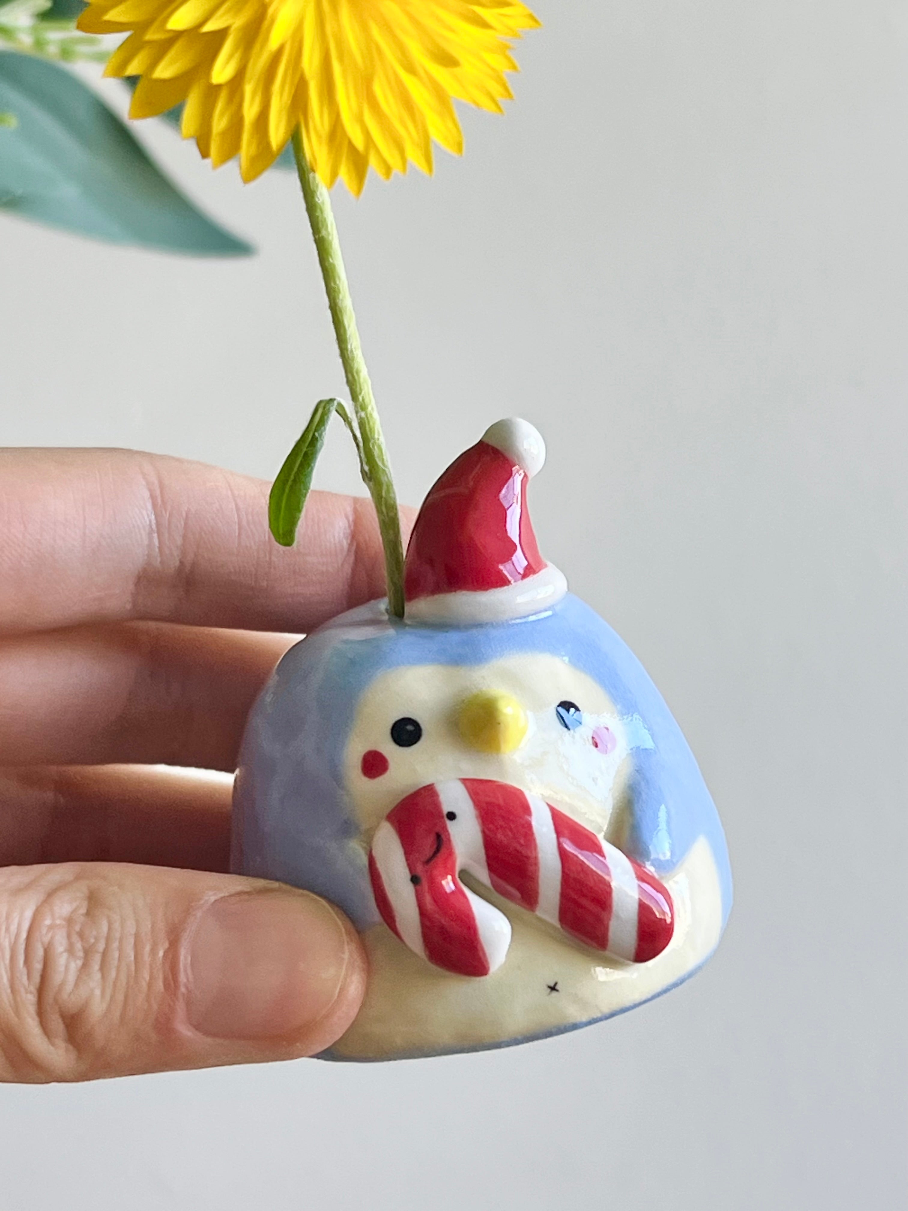 Mini festive penguin with candy cane friend bud vase