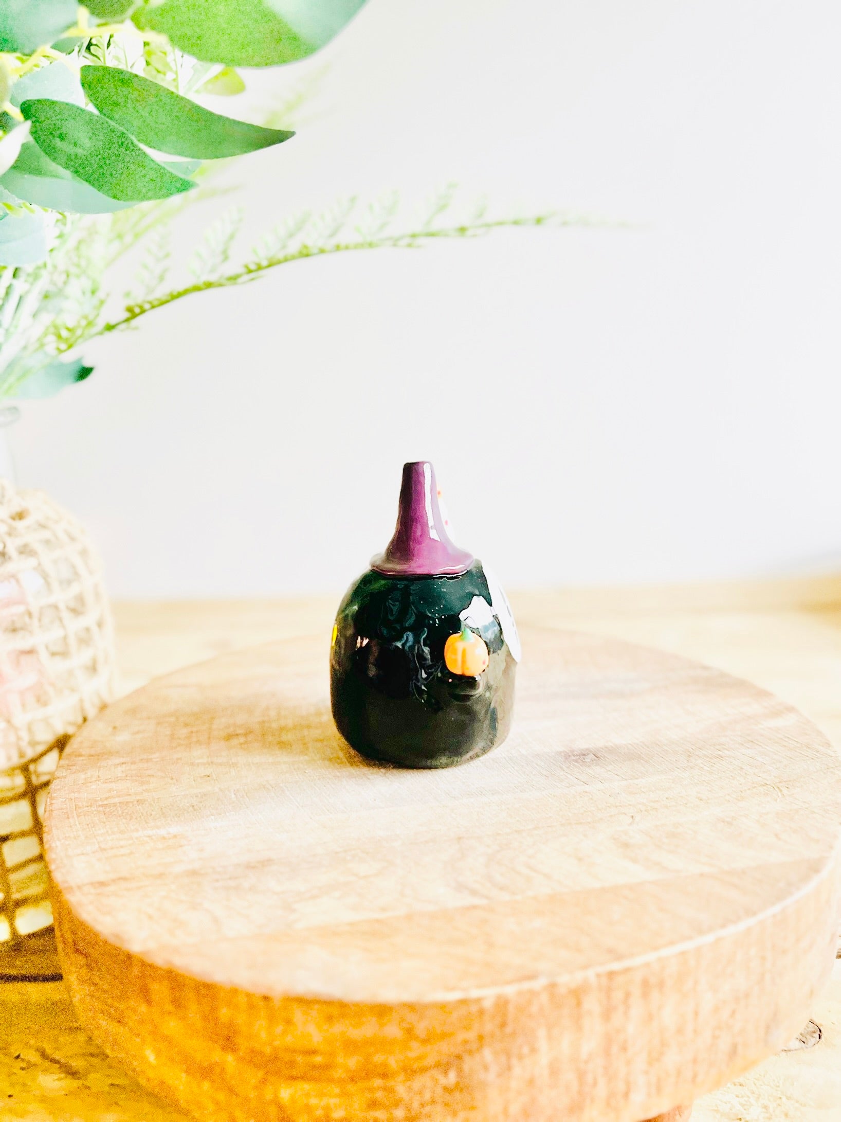 No Face witch with ghost and pumpkin friends bud vase