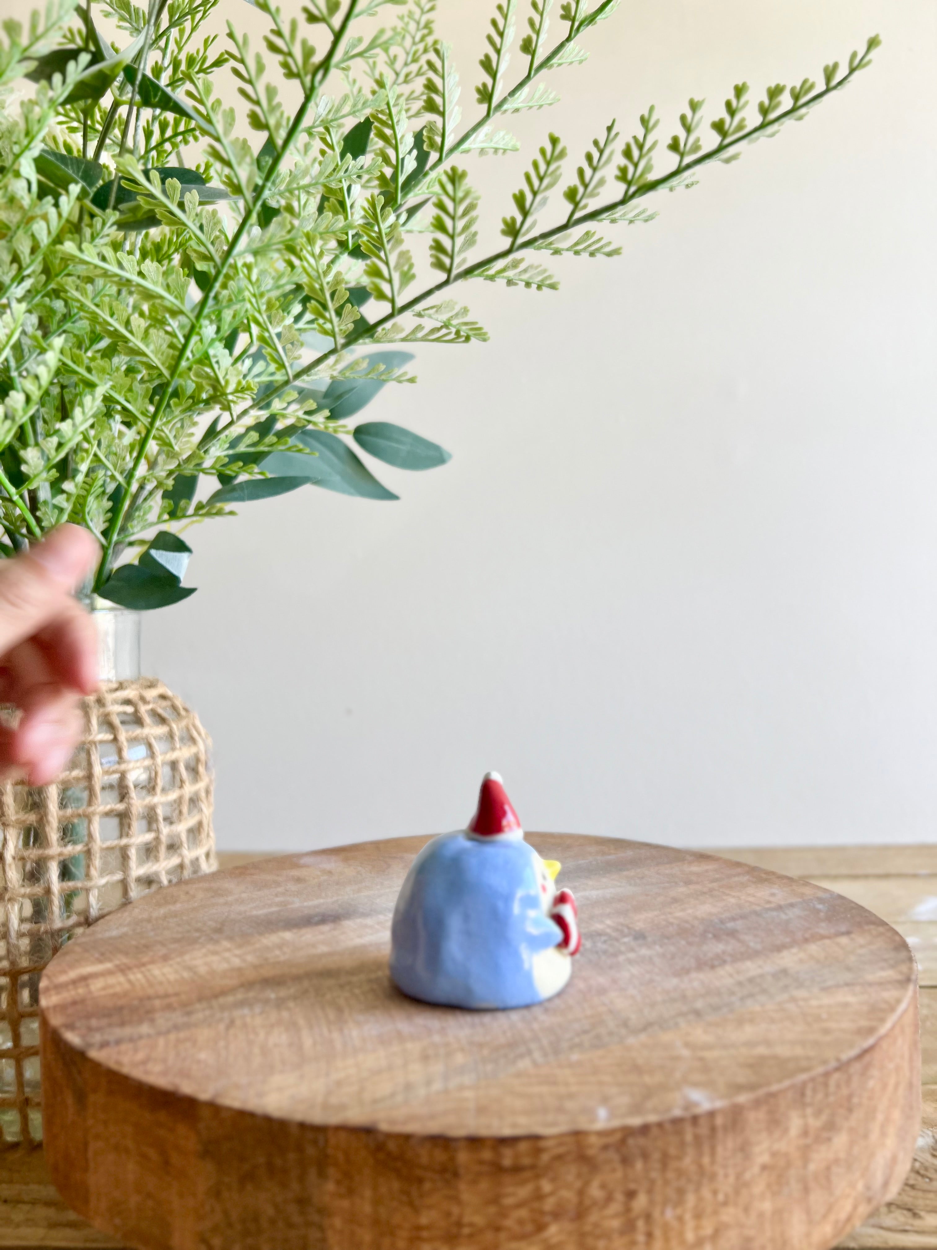 Mini festive penguin with candy cane friend bud vase