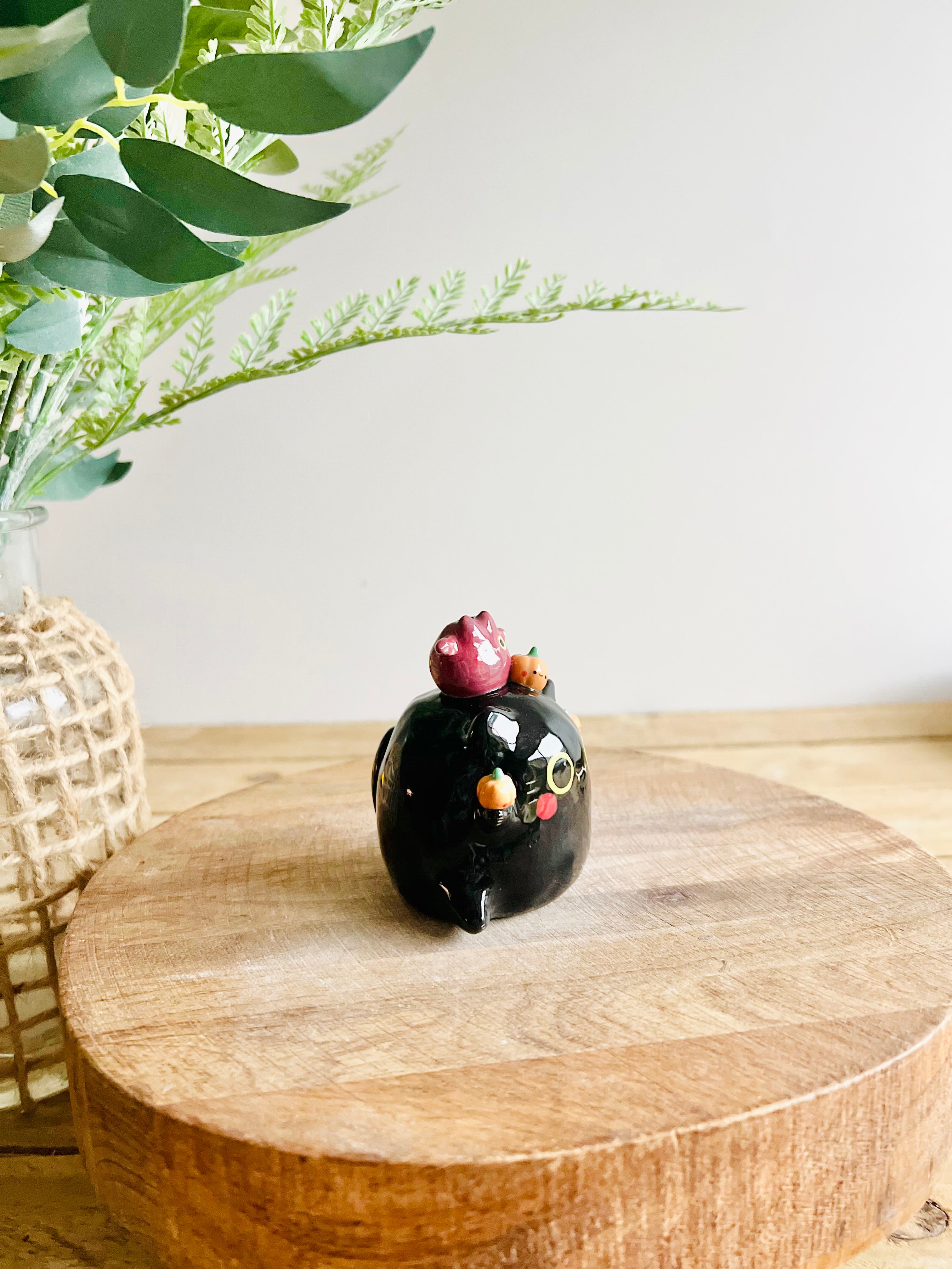 Black cat with bat and pumpkin friends bud vase