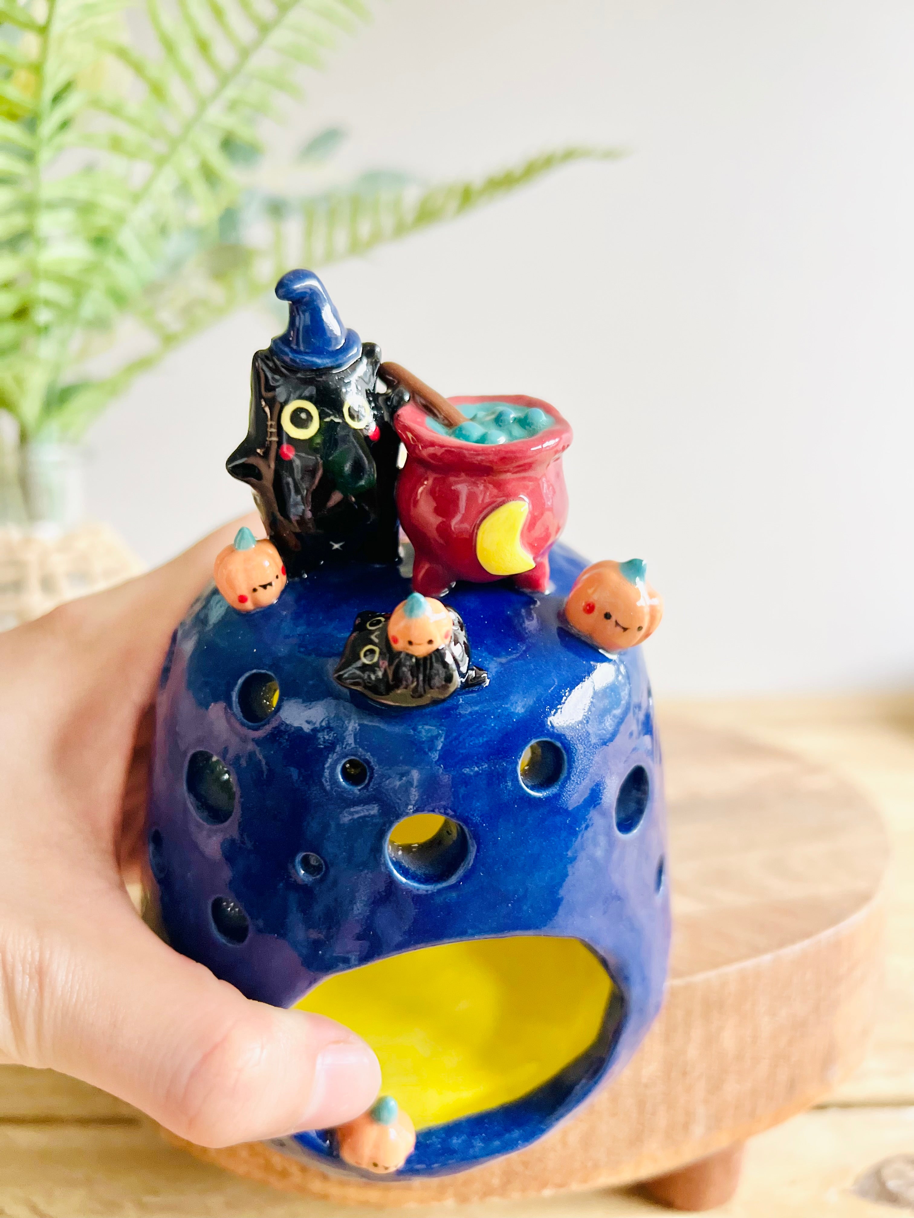 SECONDS: Cat witch with cauldron and pumpkin friends candle holder