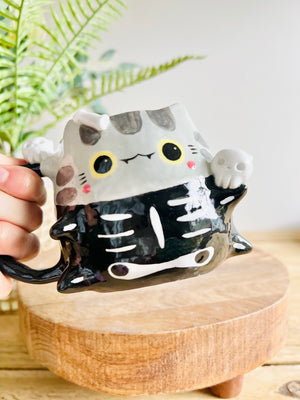 Skeleton cat mug with cat skull friends