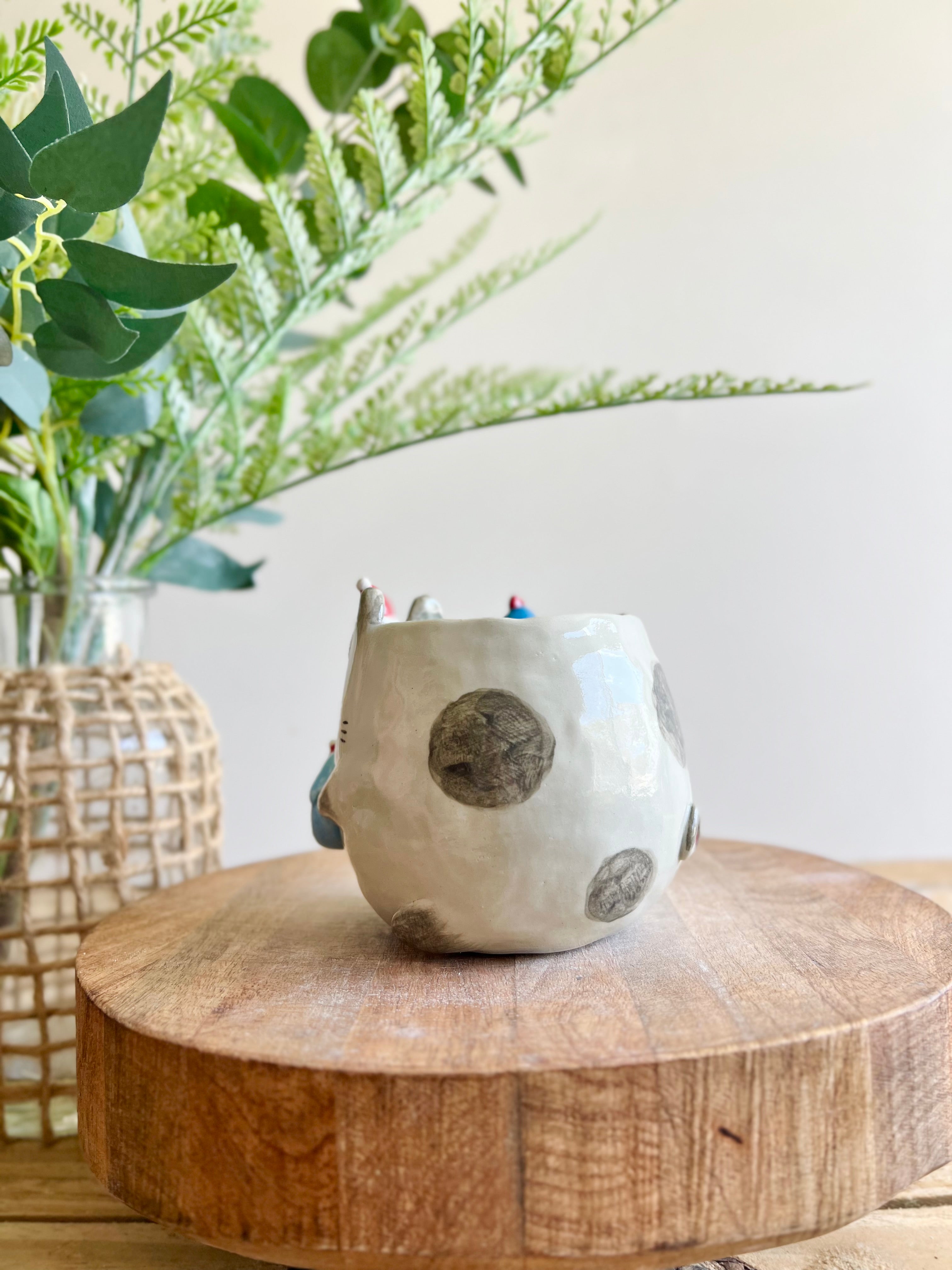 Festive bunny mug with penguin friends