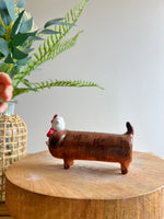 Long dog bud vase