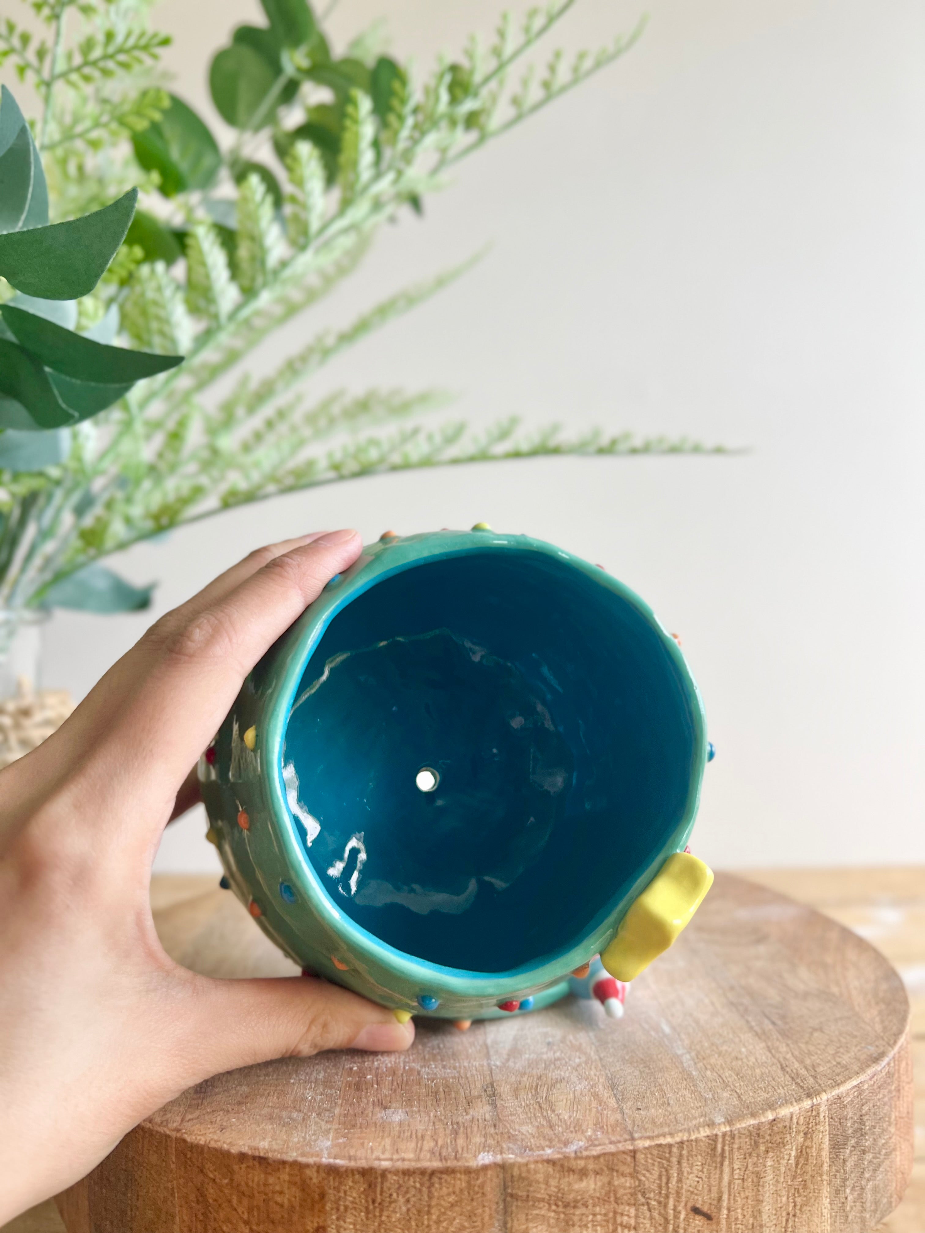 Christmas tree pot with penguin friend