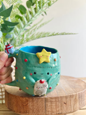 Christmas tree mug with grey cat and present friend