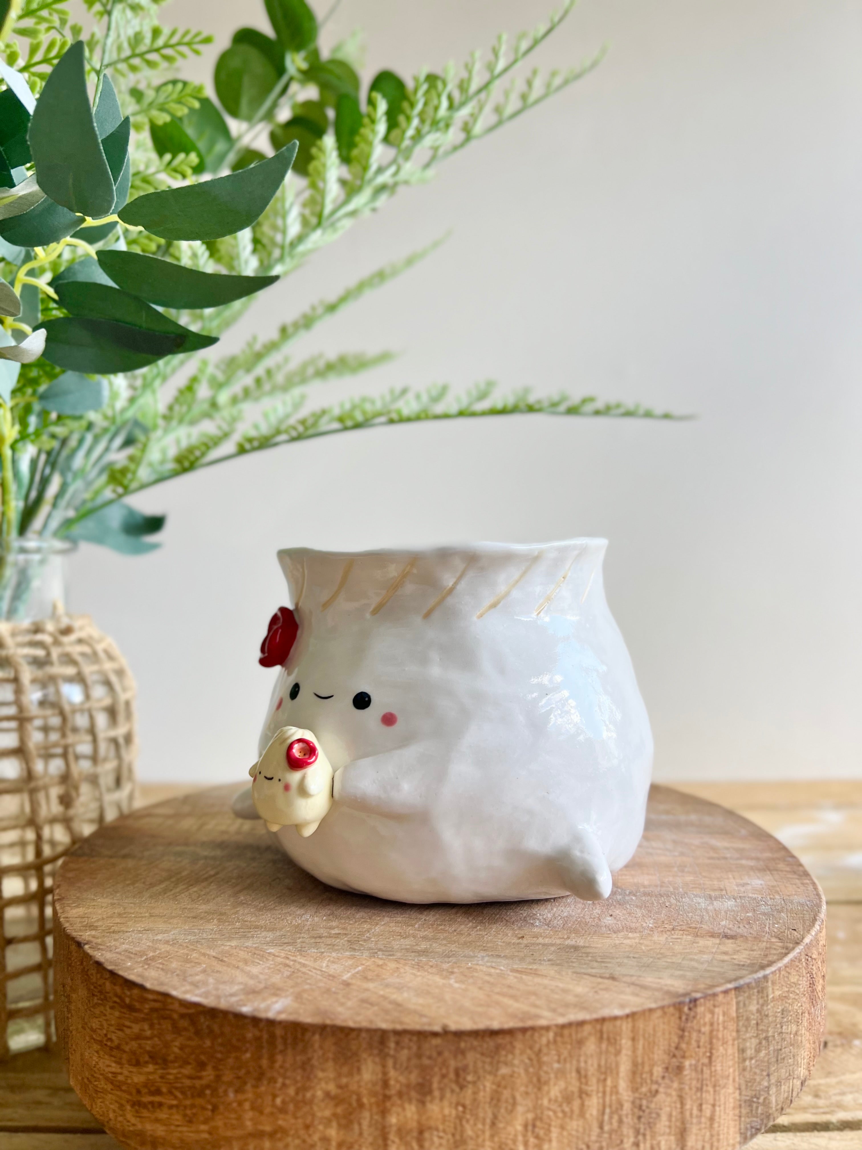 Flowery dumpling pot with baby dumpling