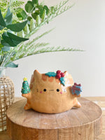 Gift bearing festive Ginger cat pot with Christmas tree friend