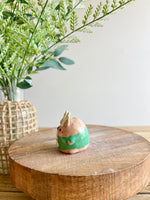 Green Christmas sweater reindeer bud vase