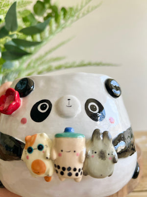 Flowery panda pot with bubble tea and animal friends