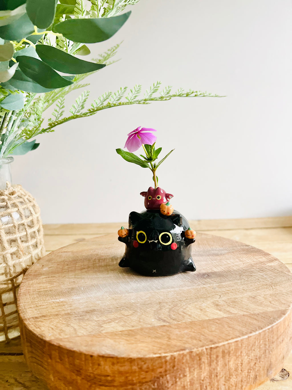 Black cat with bat and pumpkin friends bud vase