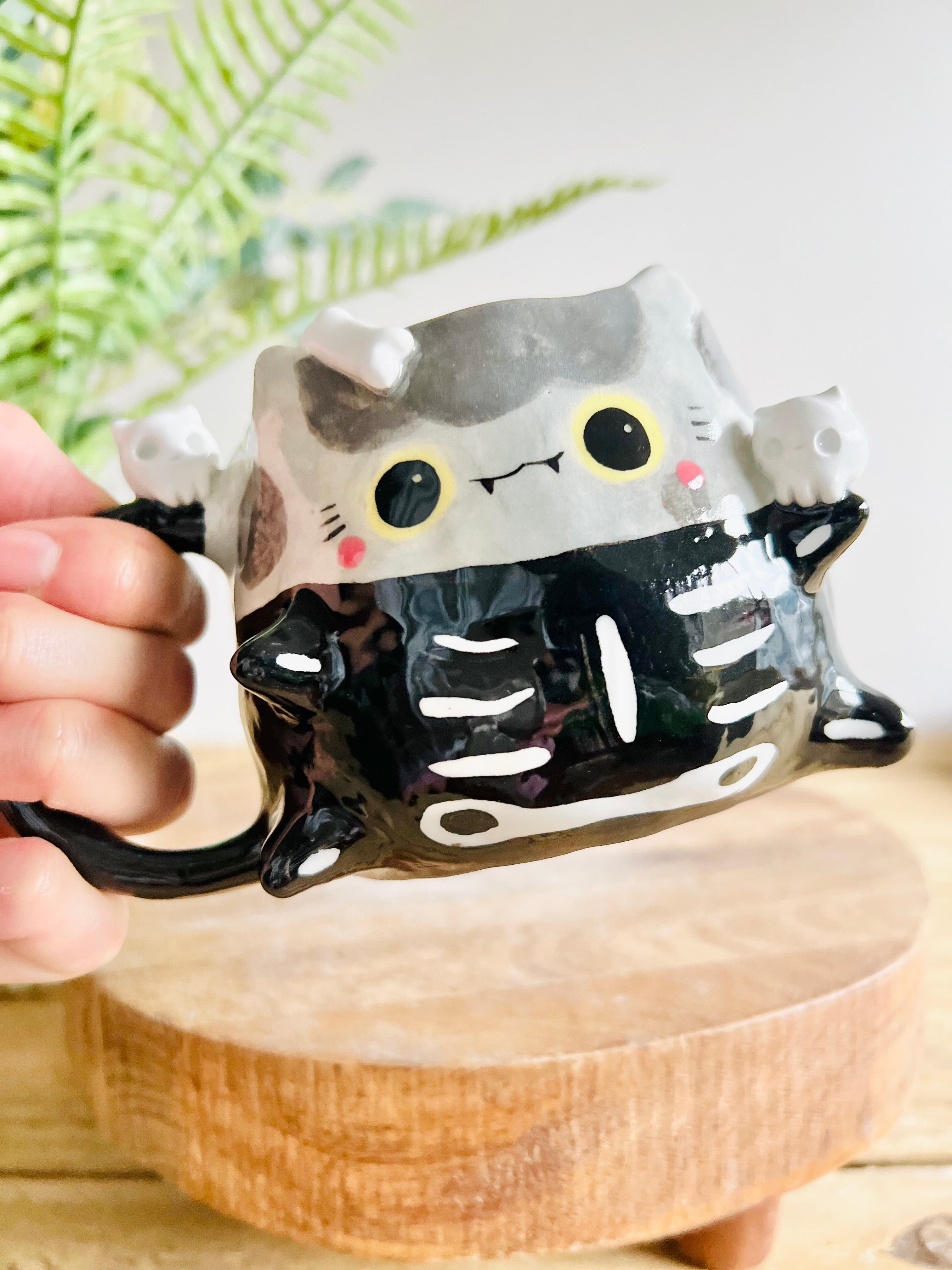 Skeleton kitty mug with cat skull friends