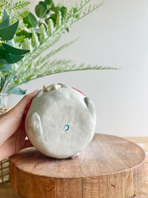 Festive grey bunny pot with gingerbread friend